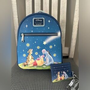 Loungefly Disney Winnie Pooh Stars GITD & Light-up mini backpack and car…
